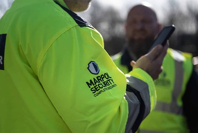 Two Marpol officers in hi-vis vests