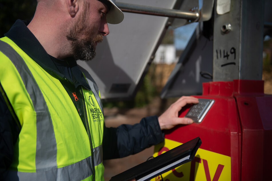 A Marpol employee operating a Marpol CCTV Tower